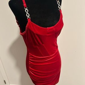 Beautiful red dress with beautiful straps for a night out. Size small.